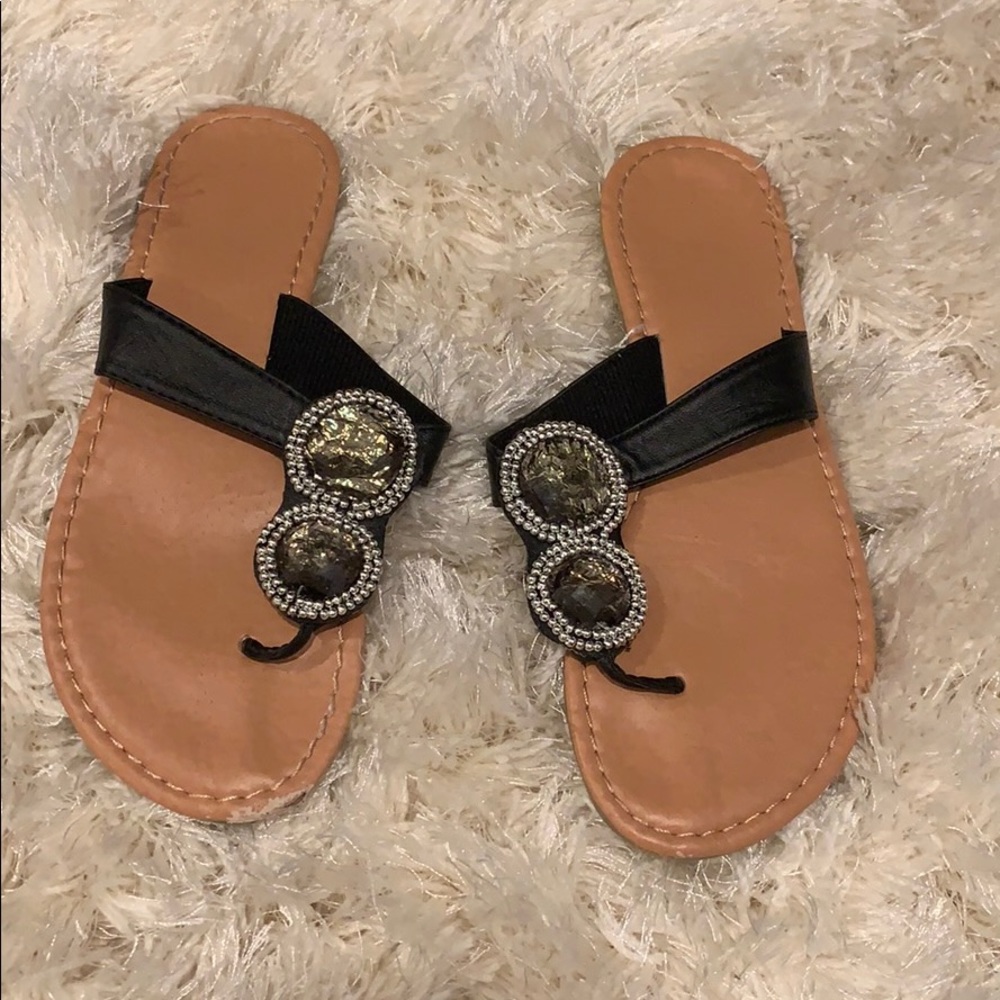 Nice flip flops with black leather straps size 6